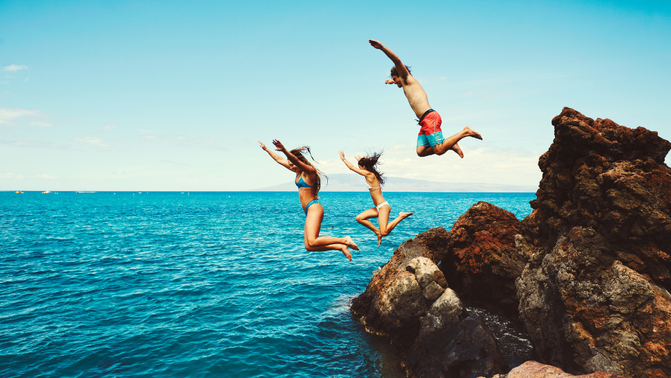 people jumping off cliff